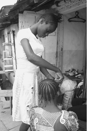 african-girls-braiding-their-natural-hair