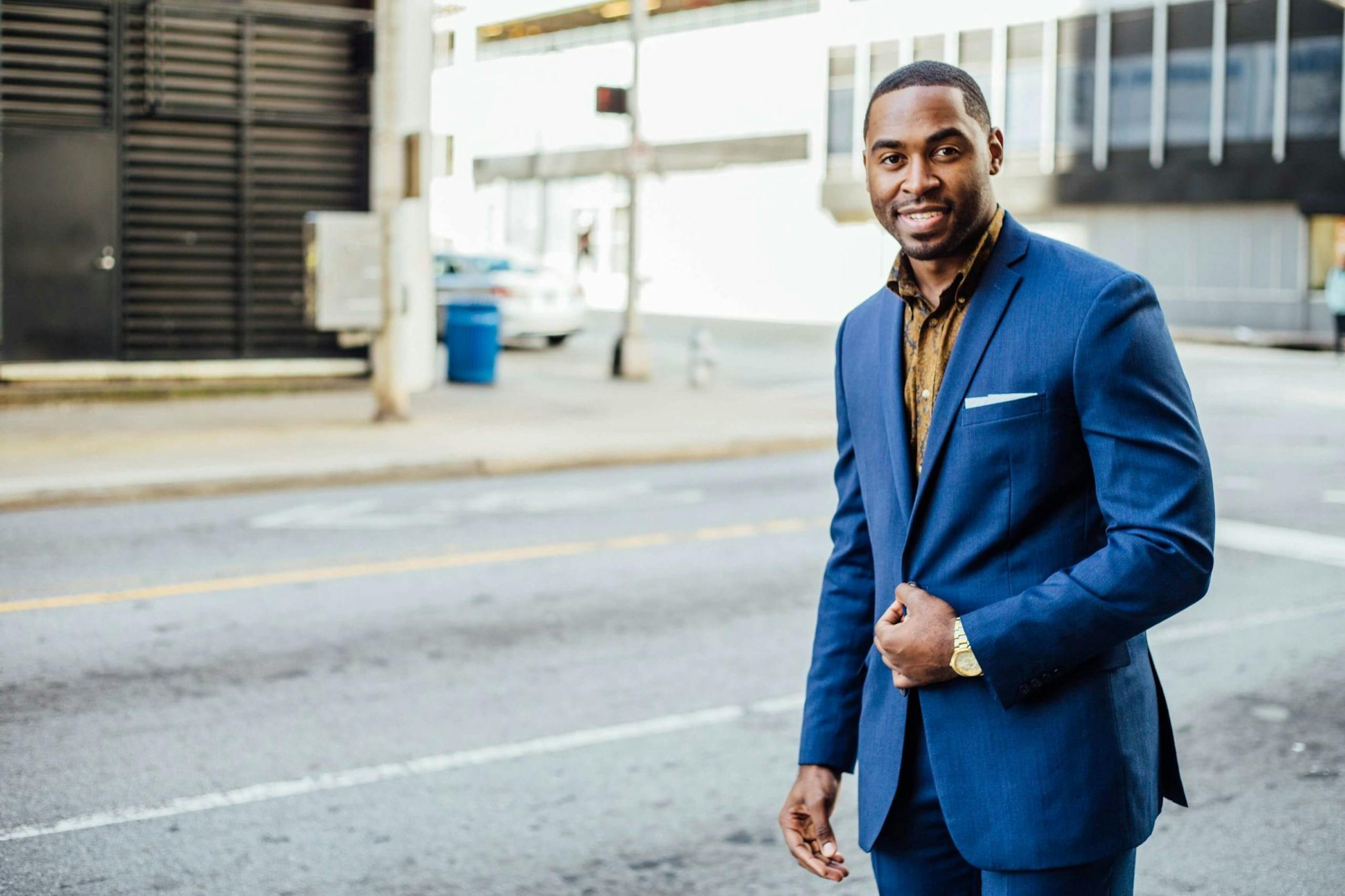 Confident Businessman in Blue Suit Outdoors